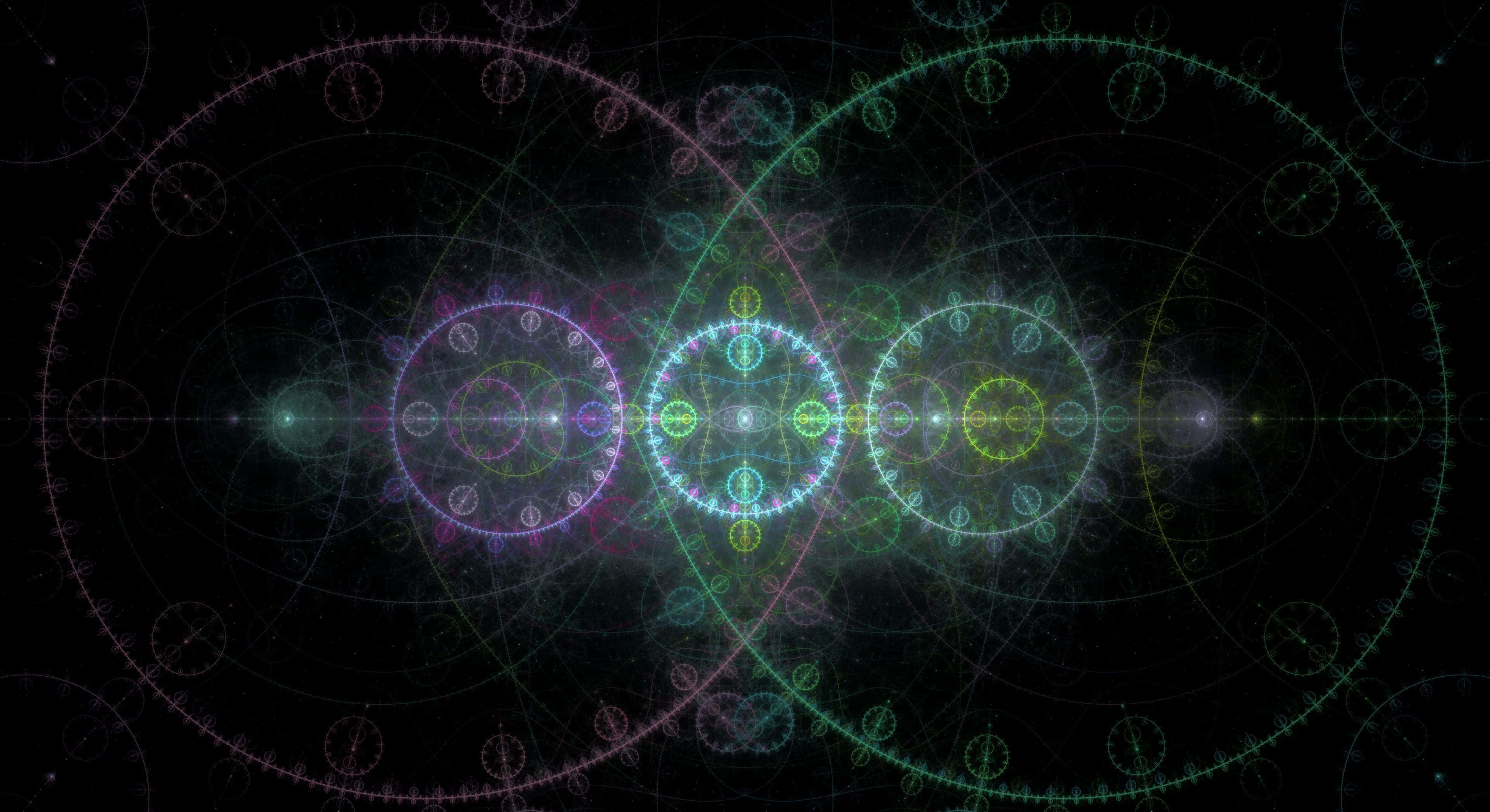 Sacred Geometry 桌布 壁紙 — 充滿活力的分形圖案在黑暗的宇宙背景下散發出霓虹色彩，形成對稱的幾何設計。