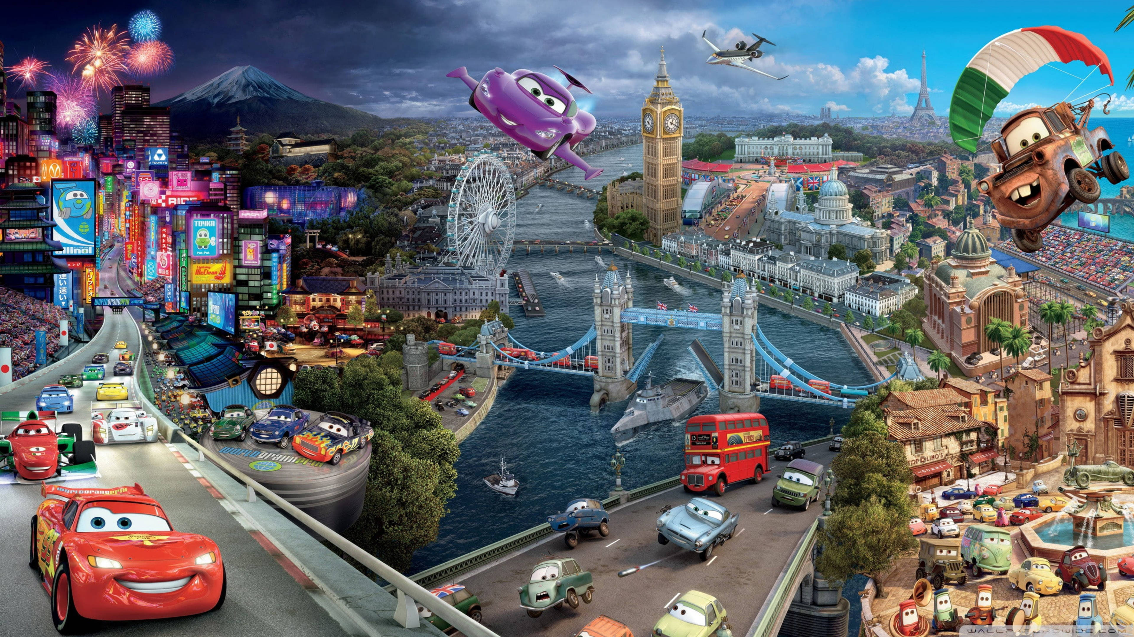 Pixar 桌布 壁紙 — 充滿活力的動畫場景，迪士尼彼思《反斗車王》角色在煙花下穿越標誌性的全球地標賽車。