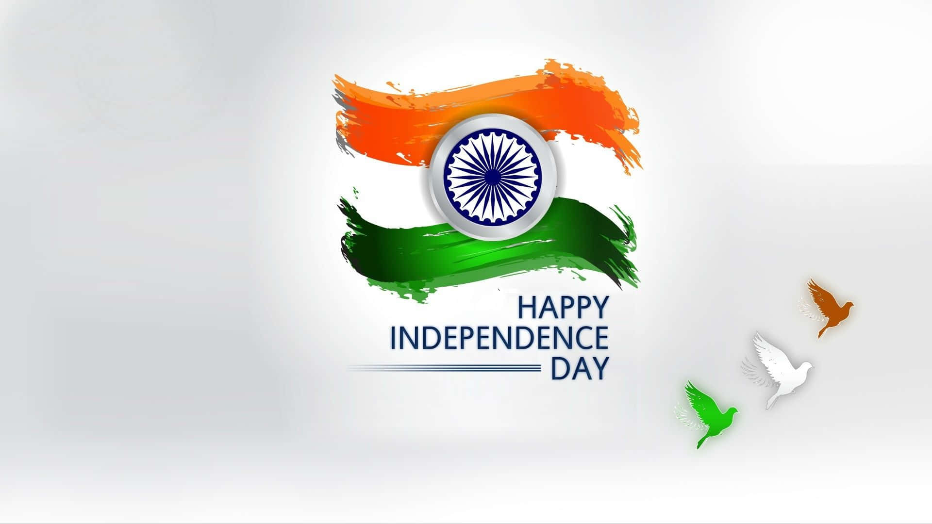 Independence Day 桌布 壁紙 — 充滿活力的印度國旗設計，帶有橙色和綠色筆觸，中間是藍色阿育王法輪，上方是「Happy Independence Day」文字，以及三隻顏色匹配的飛翔鴿子。