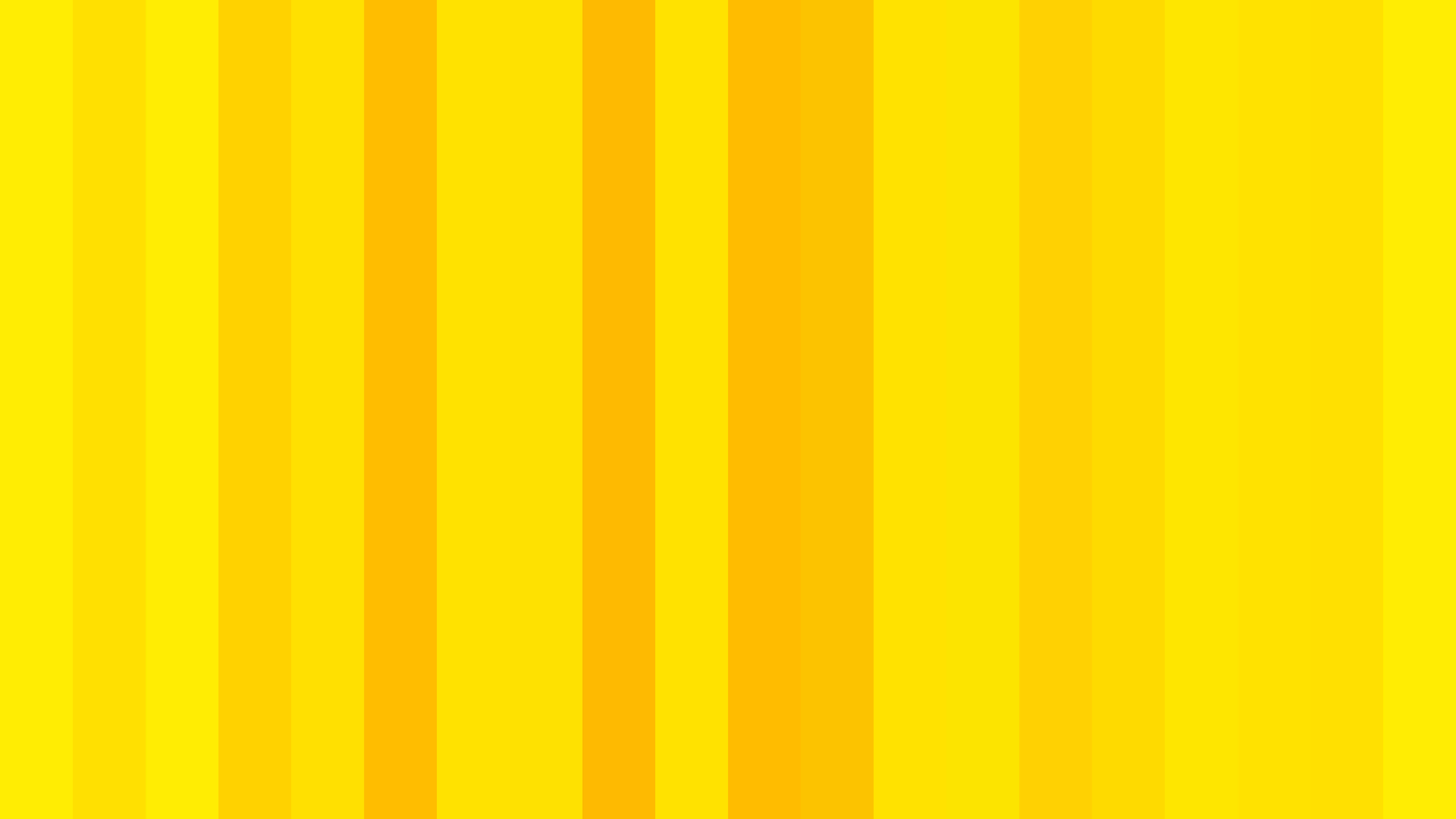 Yellow Striped 桌布 壁紙 — 充滿活力的垂直條紋以漸變黃色色調營造出大膽的抽象圖案，帶有溫暖發光的色調。
