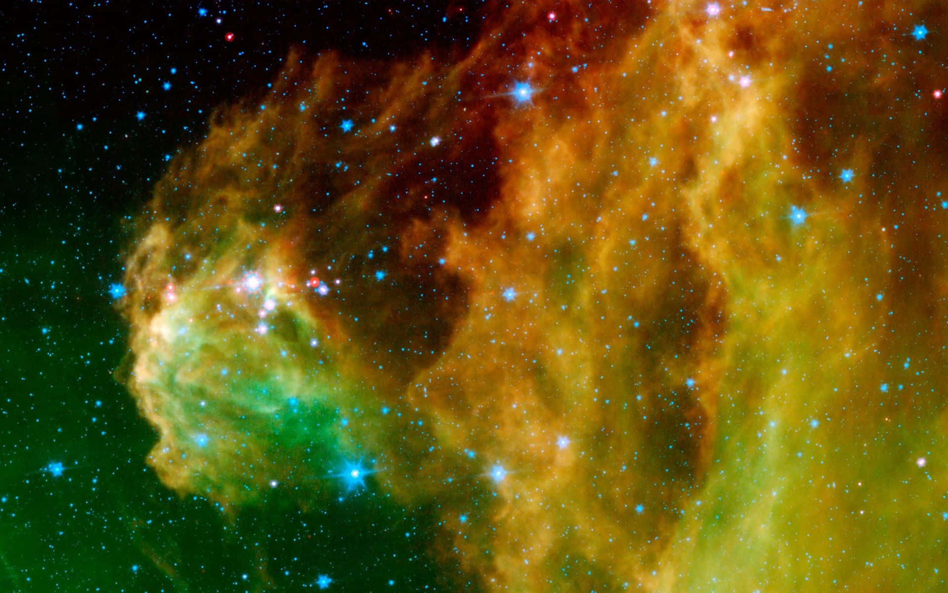 Green Galaxy 桌布 壁紙 — 充滿活力的宇宙星雲，有旋轉的橙色、黃色和綠色氣體，被明亮的藍色星星照亮，背景是黑暗的星空。