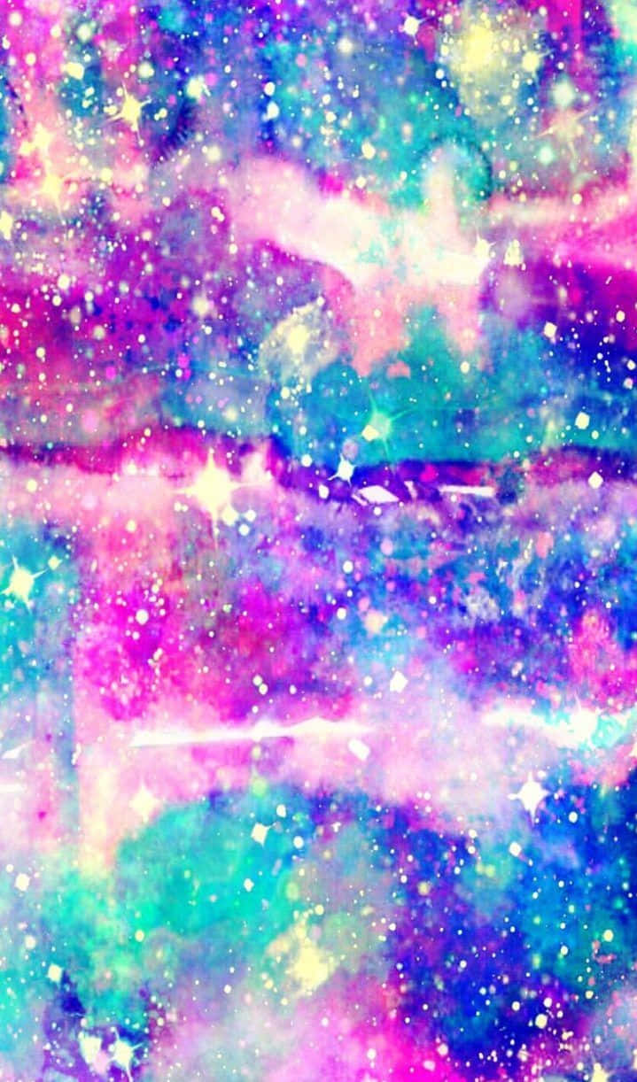 Pastel Tie Dye 桌布 壁紙 — 充滿活力的宇宙星雲，閃爍的星星呈現粉紅、青綠和紫色調。