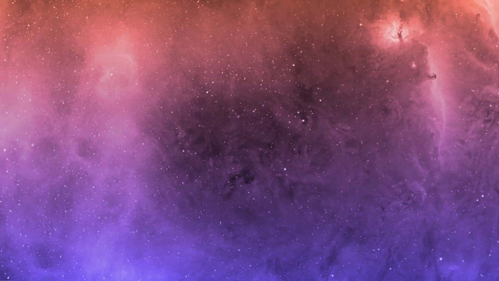 互動 桌布 壁紙 — 充滿活力的宇宙星雲在粉紅色、紫色和藍色中旋轉，閃爍的星星散落在深邃的太空中。