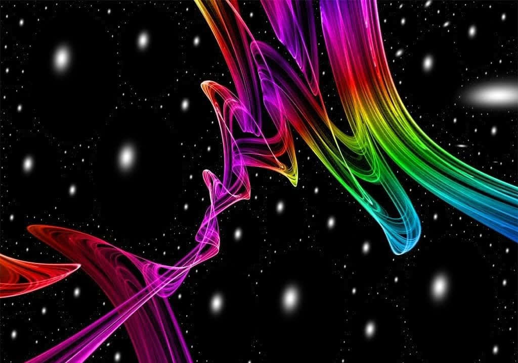 型格 桌布 壁紙 — 充滿活力的彩虹色宇宙絲帶在深空星場背景下動態流動。