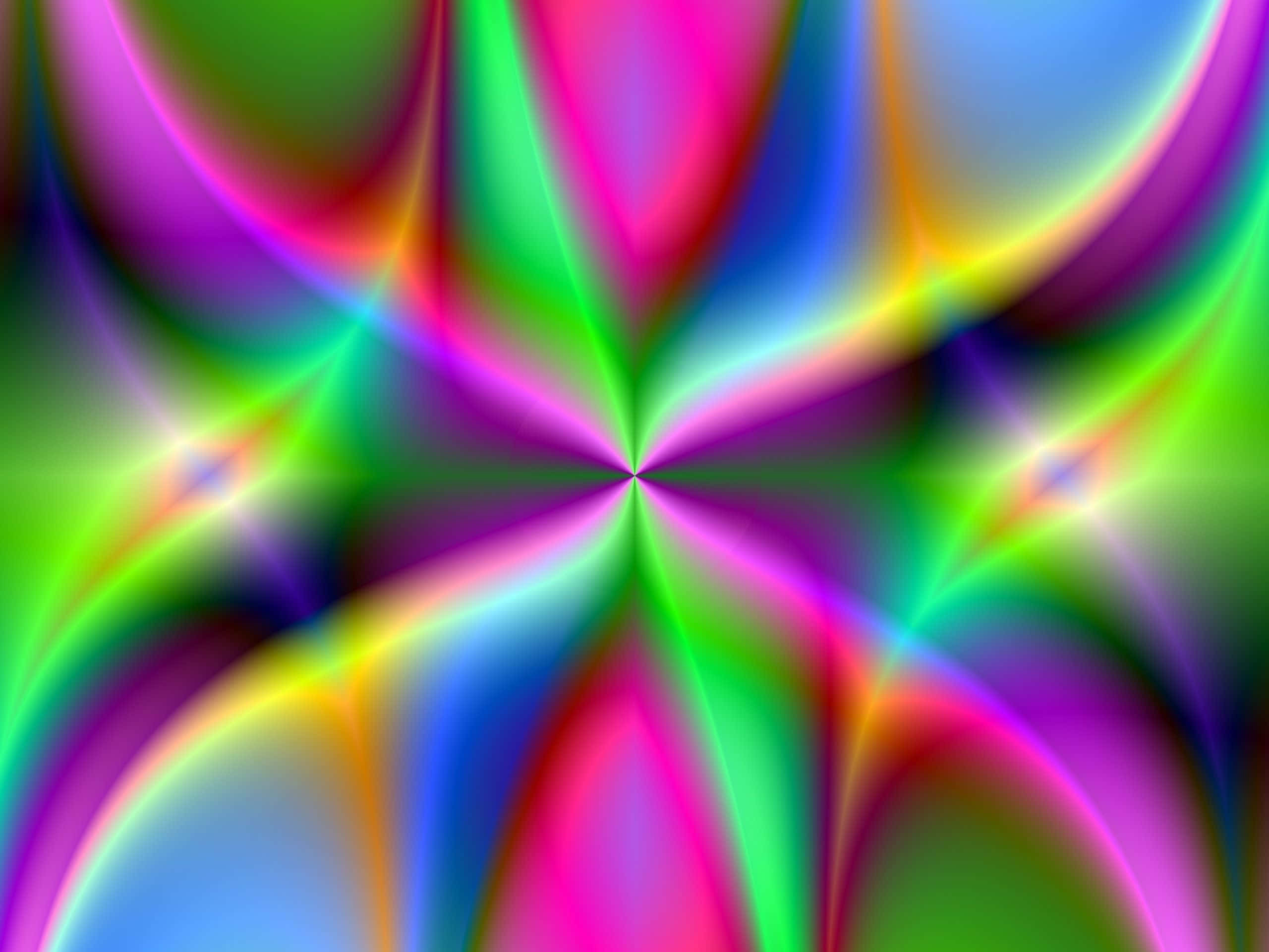 Neon Colors 桌布 壁紙 — 充滿活力的抽象分形圖案從中心向外輻射，帶有粉紅、綠、藍和黃色的霓虹漸變。