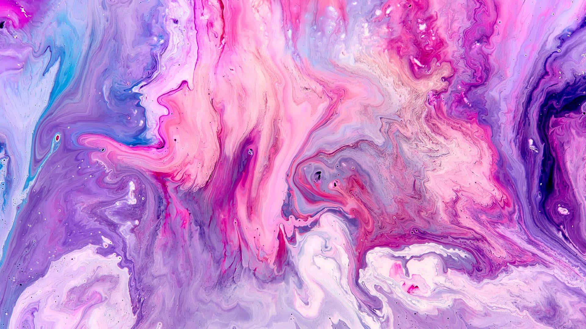 Paint Art 桌布 壁紙 — 充滿活力的旋轉抽象顏料流動，呈現粉紅色、紫色和藍色，營造出夢幻般的宇宙流體藝術紋理。