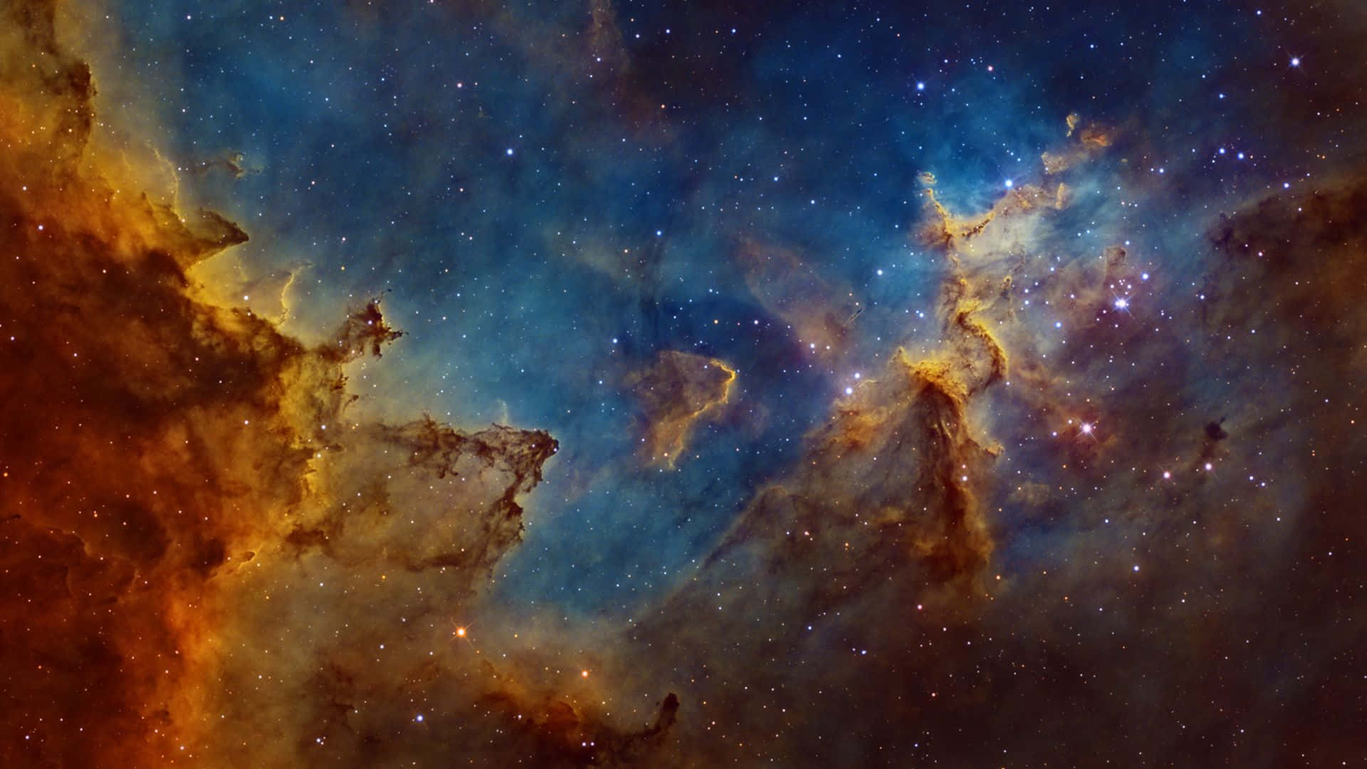 星雲 桌布 壁紙 — 充滿活力的橙色和藍色宇宙雲層在令人嘆為觀止的深空星雲中與無數恆星旋轉。