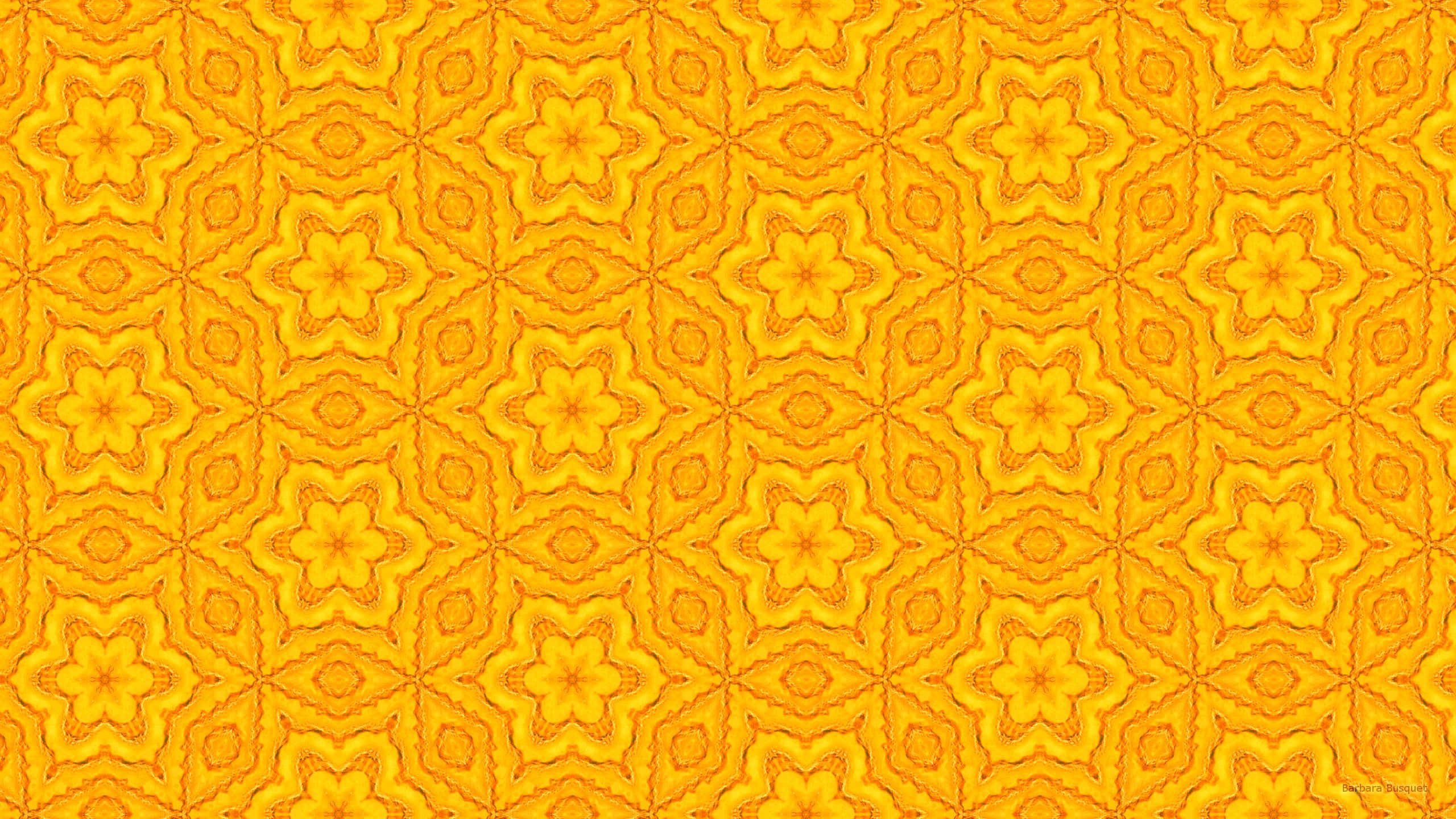 Yellow Pattern 桌布 壁紙 — 充滿活力的橙色幾何圖案，帶有重複的星爆圖案和複雜的格子設計。