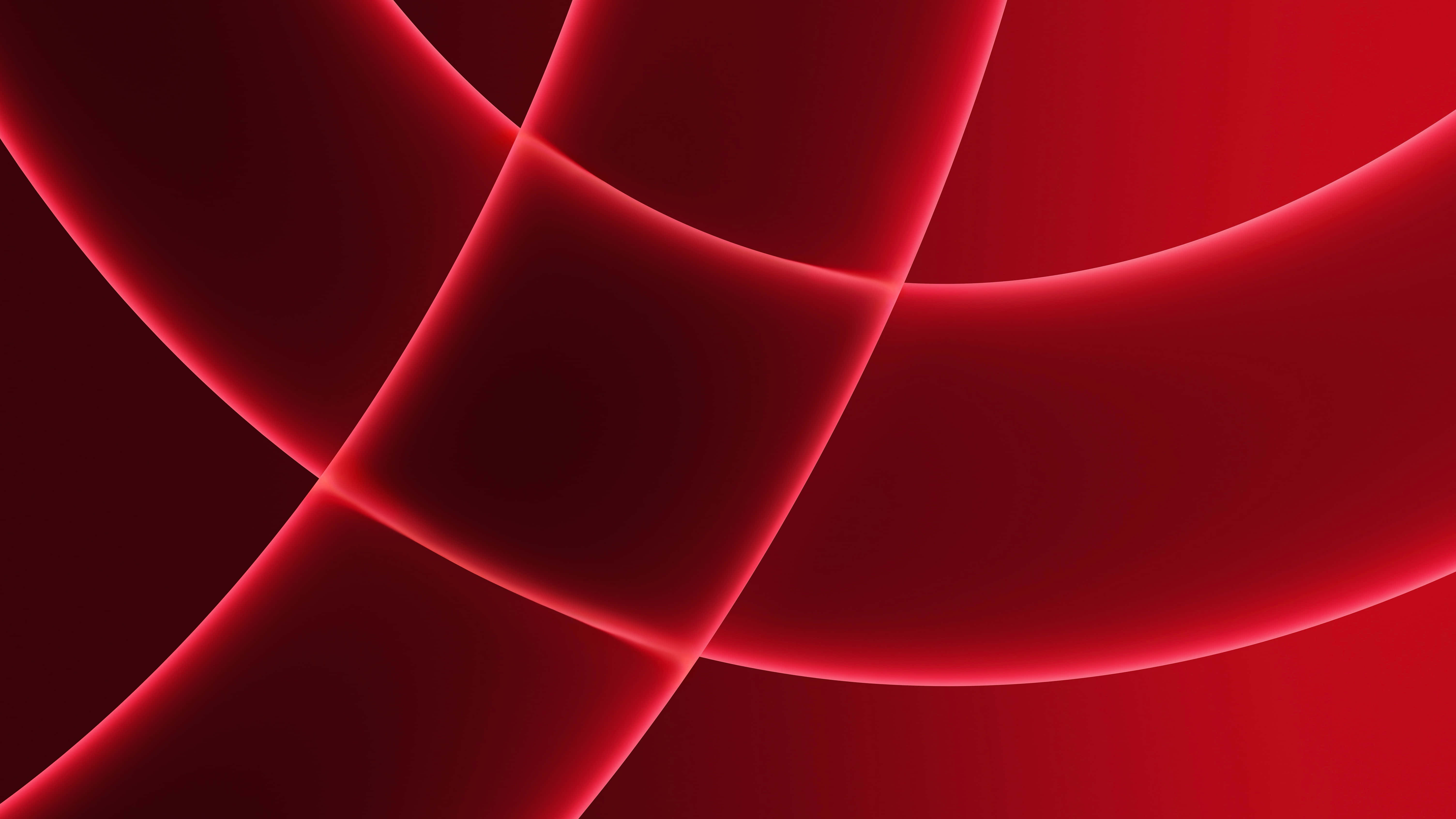 macOS 桌布 壁紙 — 充滿活力的發光紅色曲線在深紅色的漸變背景上動態交錯。