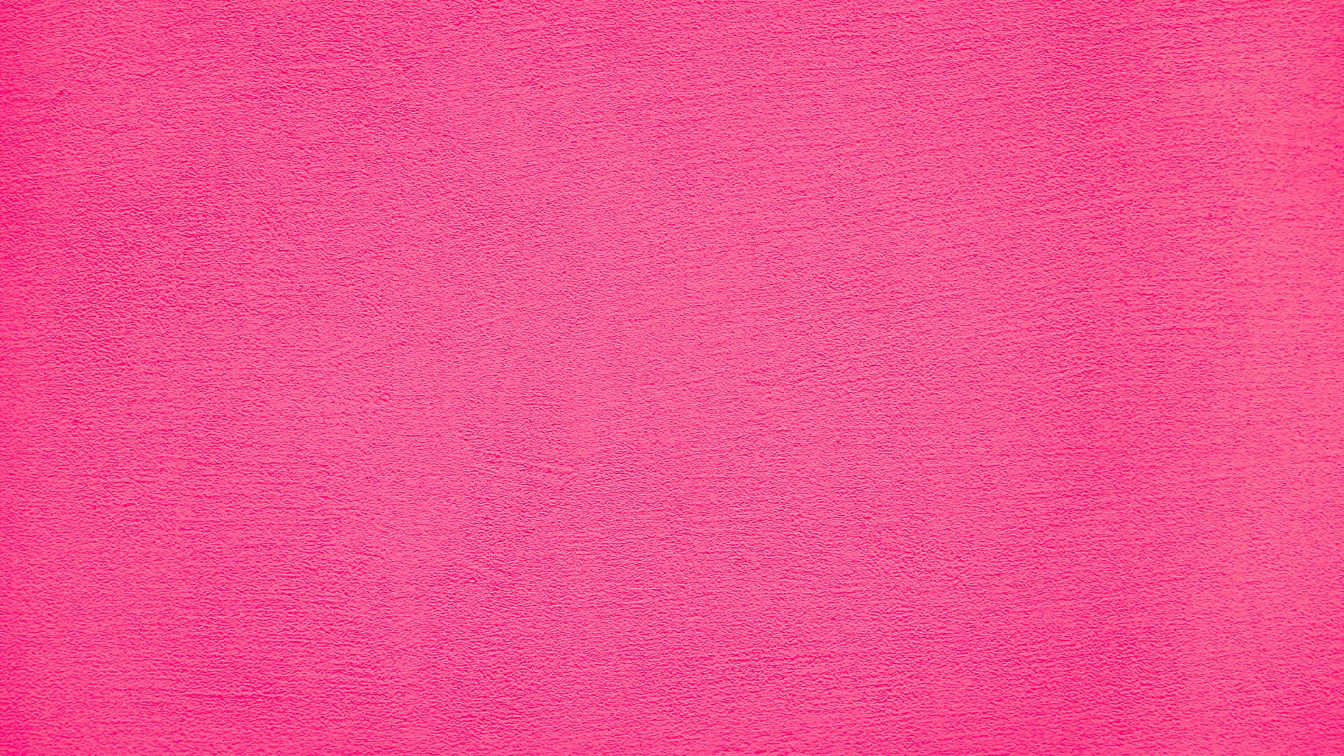 Pink Texture 桌布 壁紙 — 充滿活力的粉紅色紋理表面，帶有微妙的漸變和觸感的顆粒狀飾面。