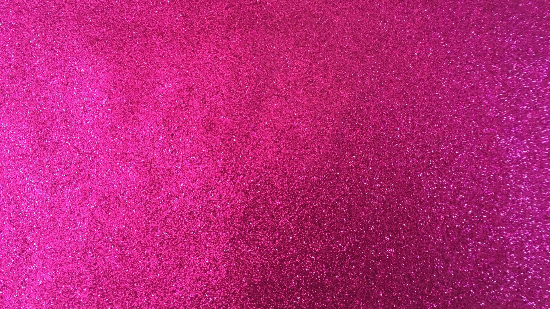 Pink Texture 桌布 壁紙 — 充滿活力的粉紅色閃粉紋理，帶有閃爍的粒子，營造出閃閃發光的抽象表面。