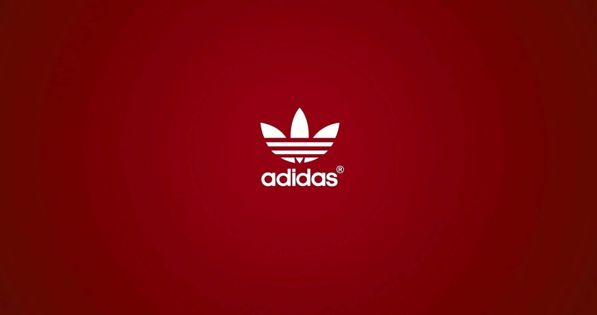 白色Adidas標誌在紅色漸變背景上