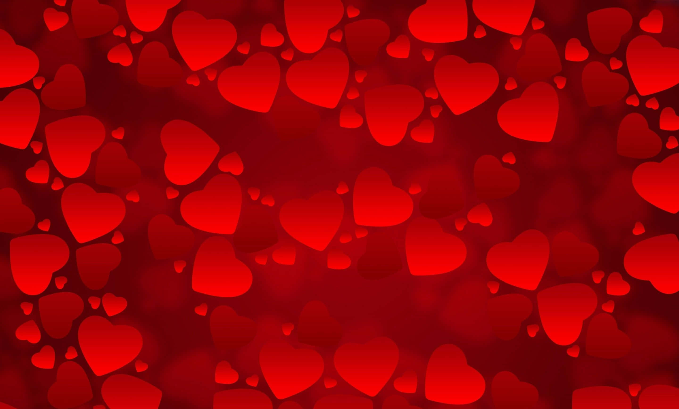 Red Heart 桌布 壁紙 — 充滿活力的紅色背景，點綴著各種大小、發光的半透明心形，營造出浪漫夢幻的氛圍。
