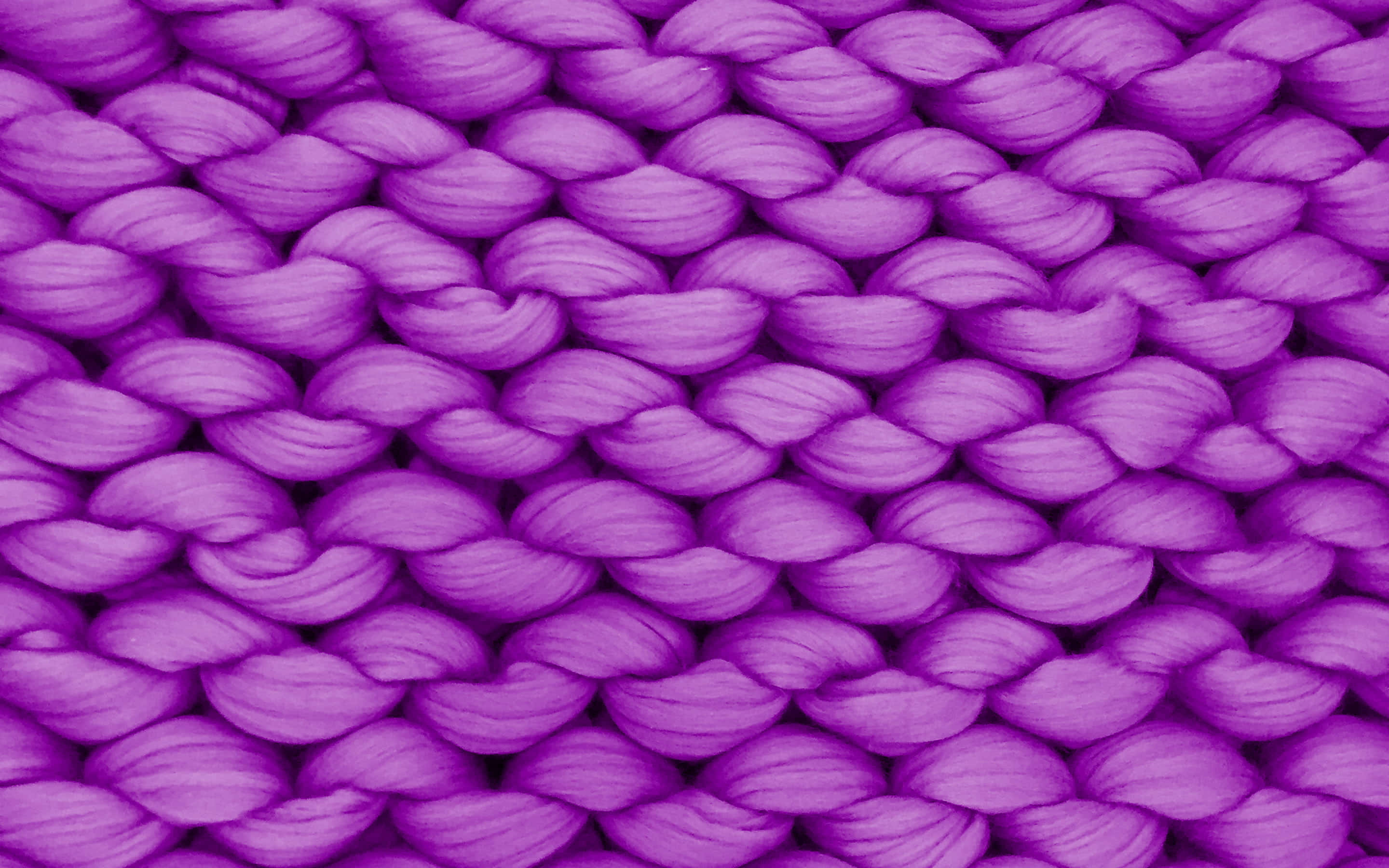 Purple Fabrics 桌布 壁紙 — 充滿活力的紫色粗針織布料的特寫，帶有紋理編織環和柔和陰影。