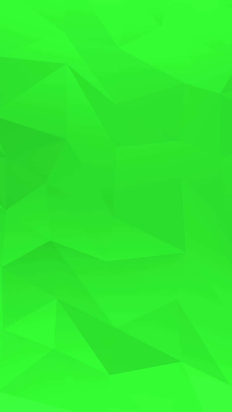 Green Geometric 桌布 壁紙 — 充滿活力的綠色低多邊形幾何牆紙，帶有銳利的角面及漸變陰影。