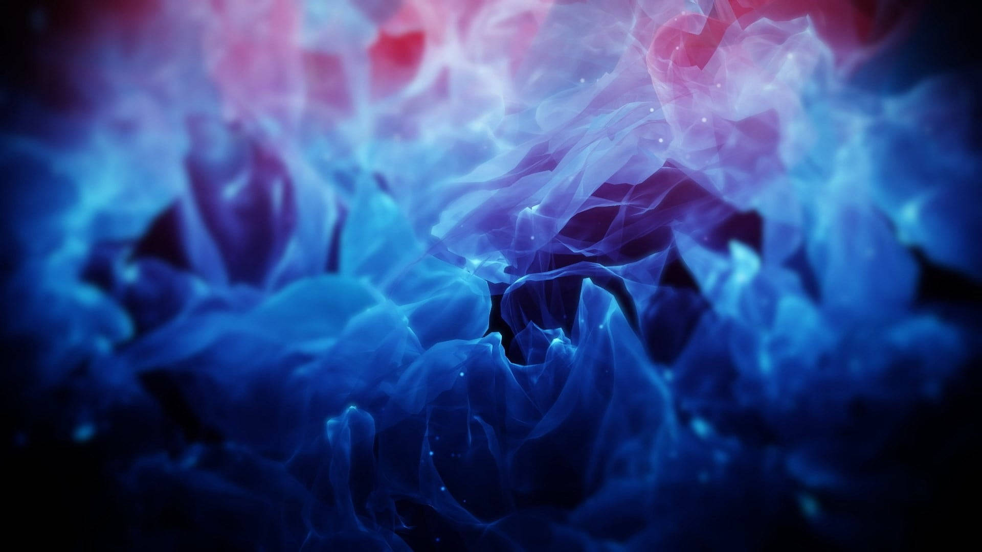 Flames 桌布 壁紙 — 充滿活力的藍色和粉紅色星雲狀煙霧漩渦，帶有發光粒子，背景為深色。