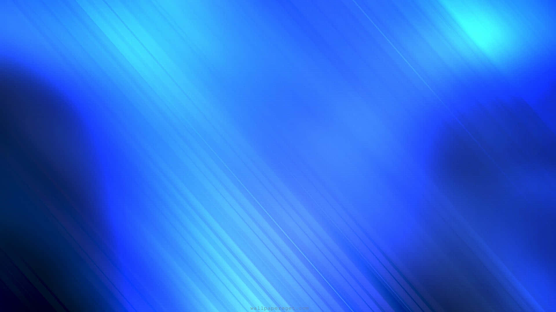 Electric Blue 桌布 壁紙 — 充滿活力的藍色抽象背景，帶有對角光條和柔和發光漸變。