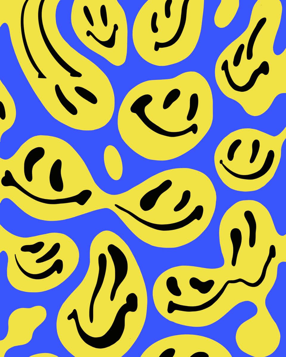 Aesthetic Smiley Face 桌布 壁紙 — 充滿活力的藍色背景，點綴著俏皮的黃色笑臉和香蕉形狀，以粗黑線條勾勒。