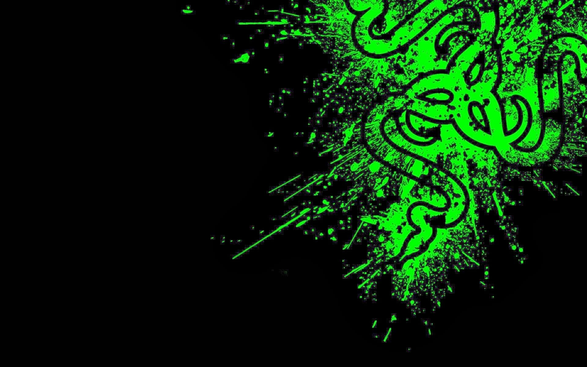 Gamer 桌布 壁紙 — 充滿活力的螢光綠色Razer標誌在純黑背景上動態爆發，帶有飛濺效果。