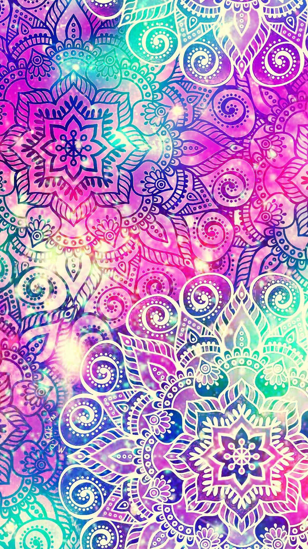 Paisley 桌布 壁紙 — 充滿活力的迷幻曼陀羅圖案，帶有發光的紫色、藍綠色和粉紅色調，以及閃爍的光效。