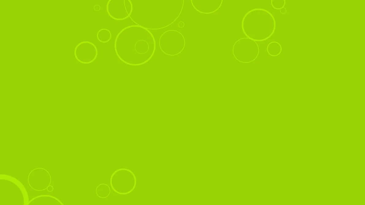 Lime Green 桌布 壁紙 — 充滿活力的青檸綠色背景，角落散落著微妙的重疊圓形輪廓。