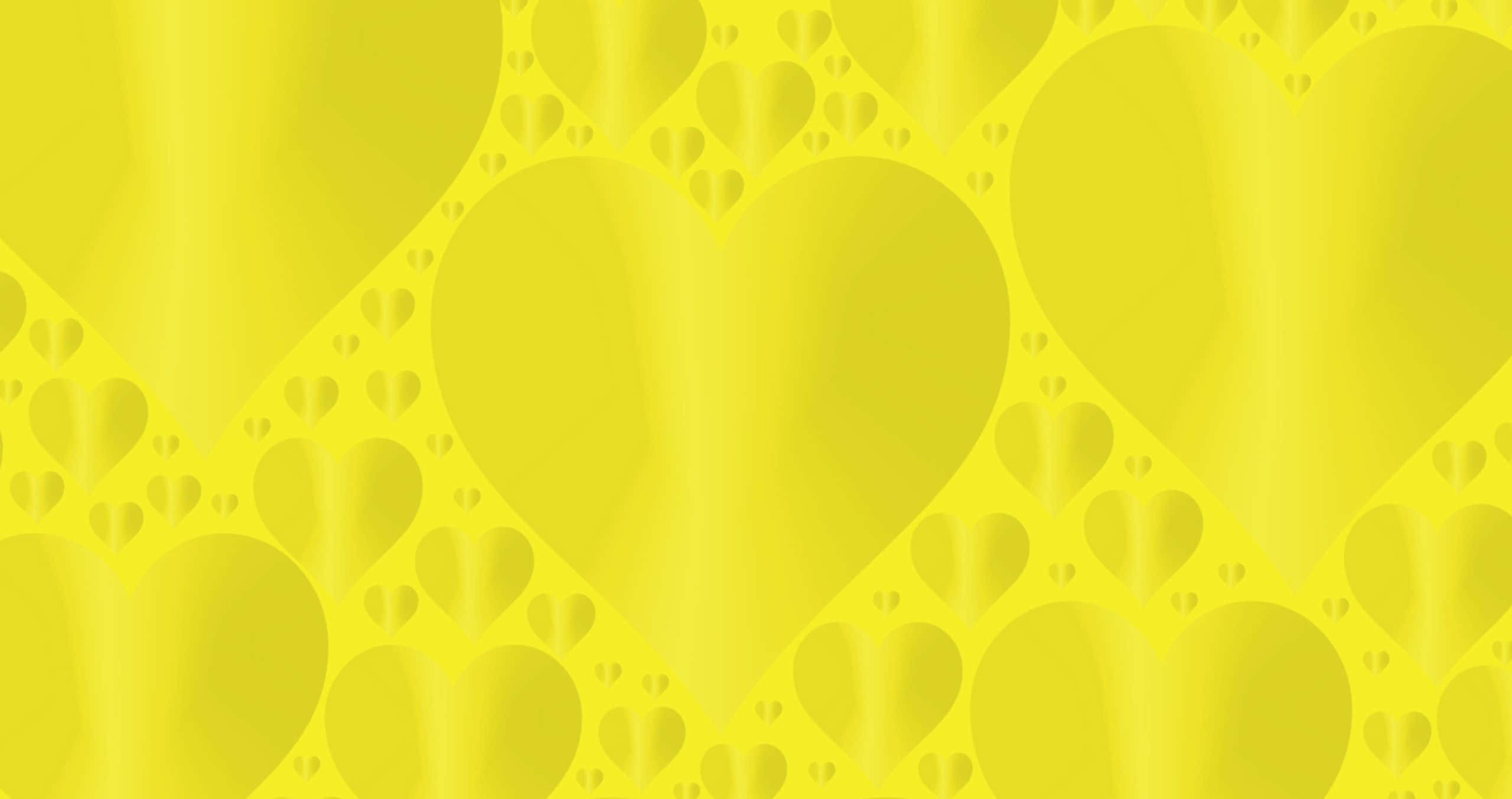 Yellow Heart 桌布 壁紙 — 充滿活力的黃色牆紙圖案，包含大小心形，帶有柔和漸變和細微陰影。