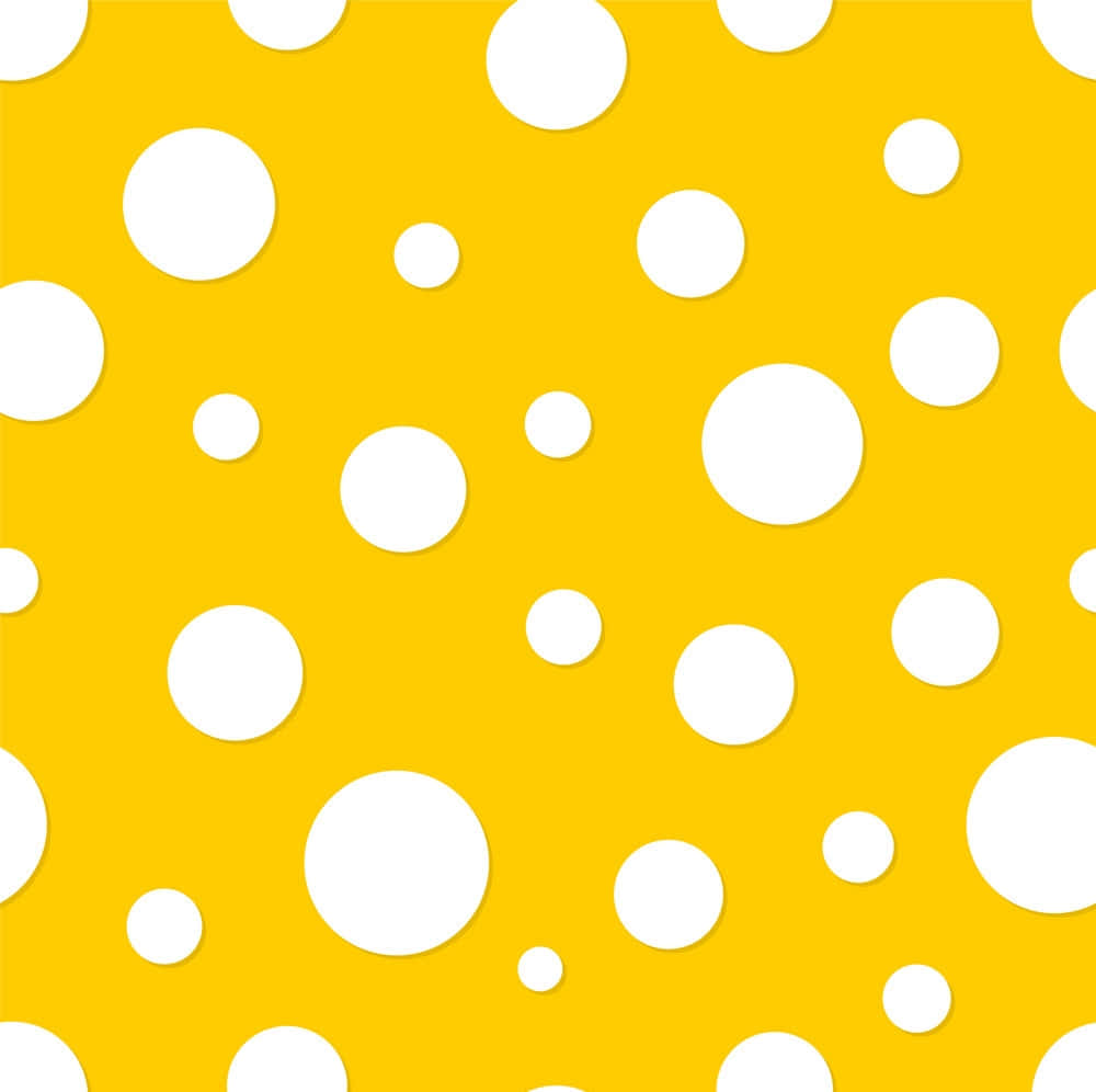 Yellow Polka Dot 桌布 壁紙 — 充滿活力的黃色背景，點綴著散落的白色圓點，大小各異。
