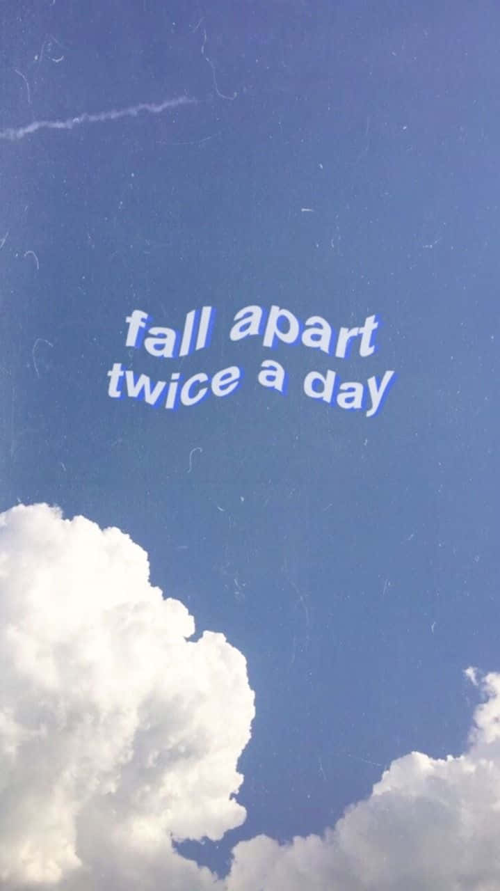 藍天白雲，文字顯示 fall apart twice a day