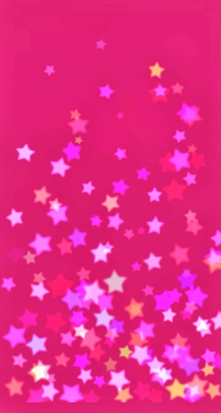 iPhone 5c 桌布 壁紙 — 充滿粉紅、紫色和黃色閃爍星星的鮮豔粉紅色背景，營造出節日魔幻的氛圍。