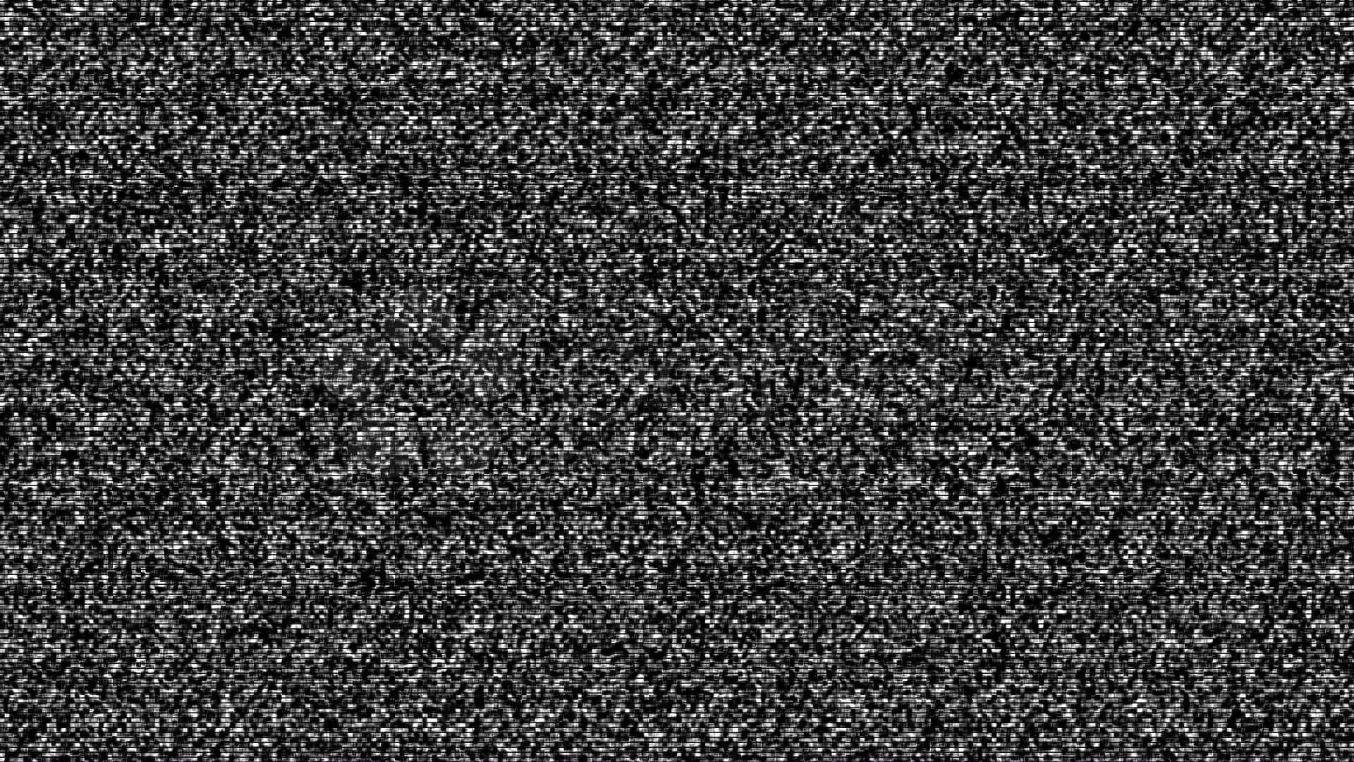 White Noise 桌布 壁紙 — 充滿靜電的黑白電視屏幕，帶有顆粒狀噪聲圖案。