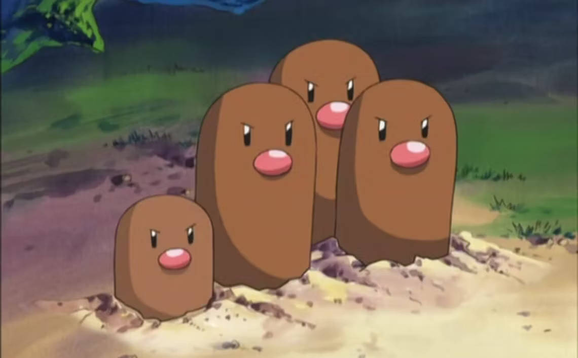 四隻 Diglett 寶可夢喺草地從沙中冒出，帶住憤怒嘅面孔。