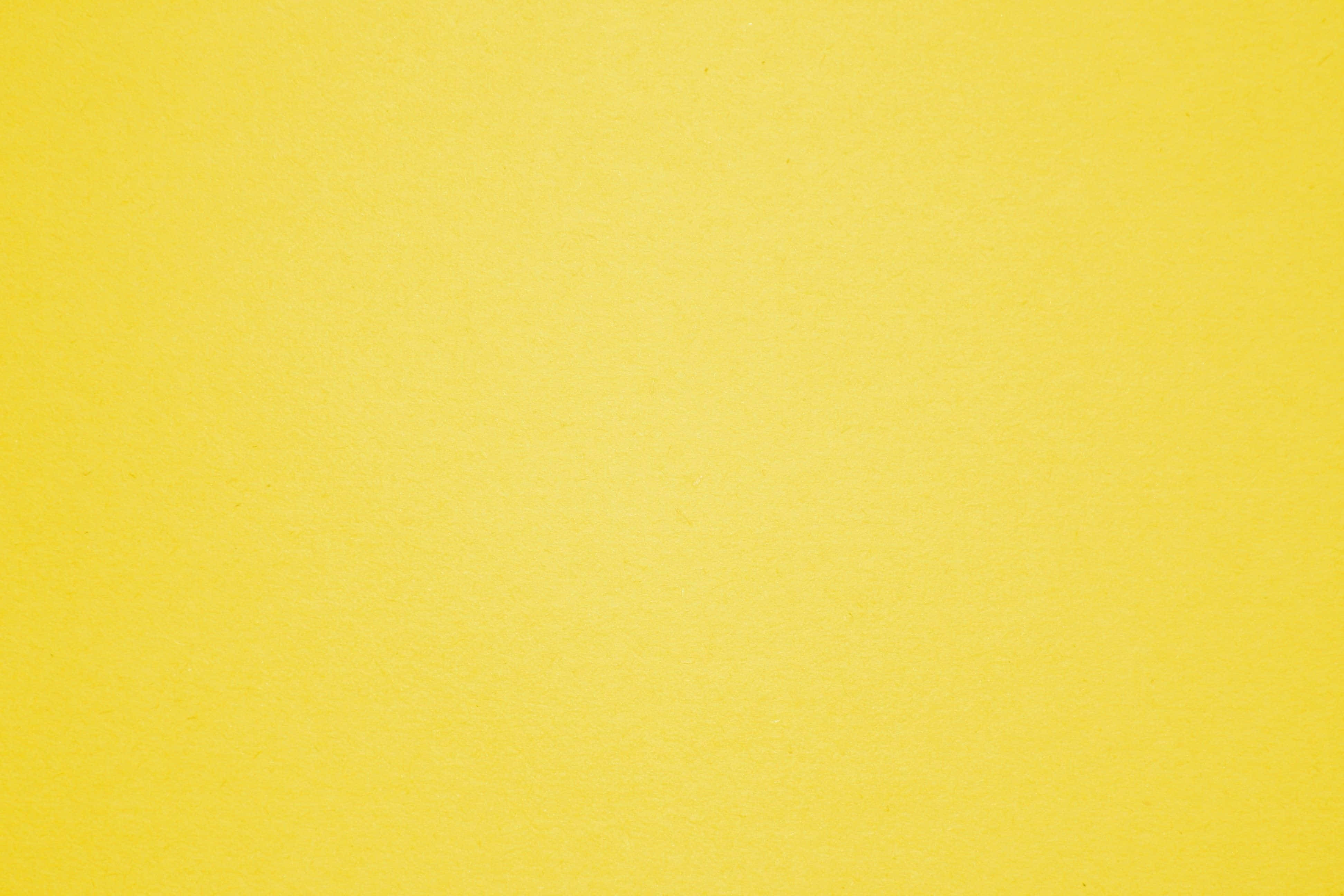 Cute Yellow 桌布 壁紙 — 光滑紋理的黃色紙張表面，色調變化微妙，細節細膩。
