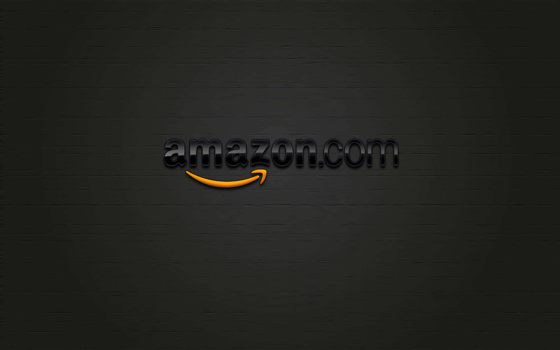 深色磚牆背景上的Amazon.com標誌