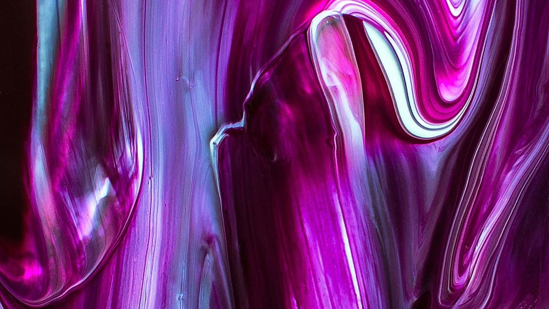 抽象流體藝術，在深色背景上呈現旋轉的洋紅色和青色。