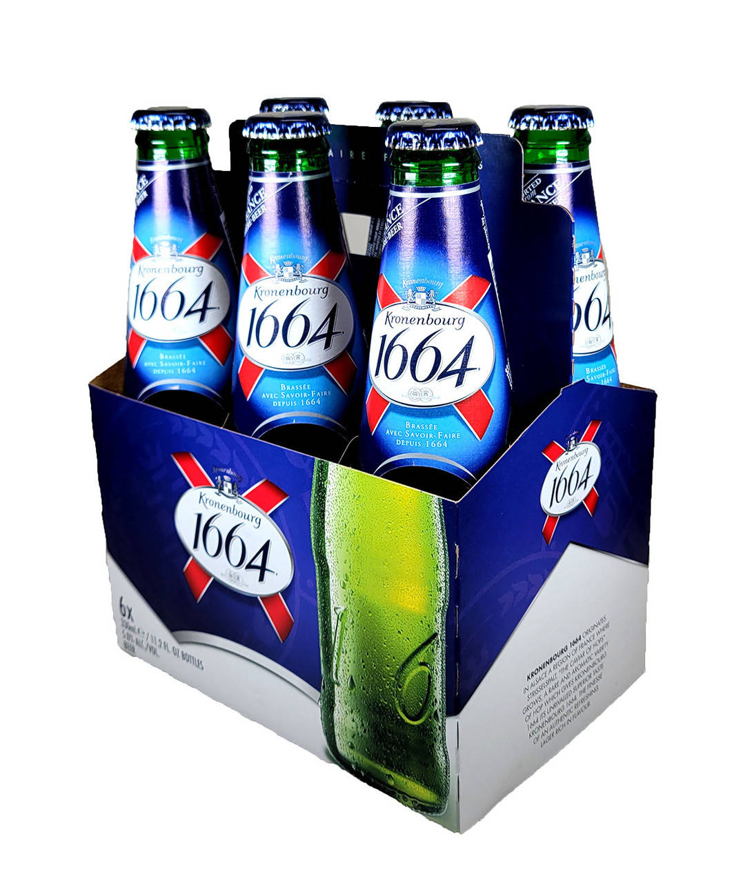 六瓶Kronenbourg 1664啤酒放在紙板托架上，有冷凝水。