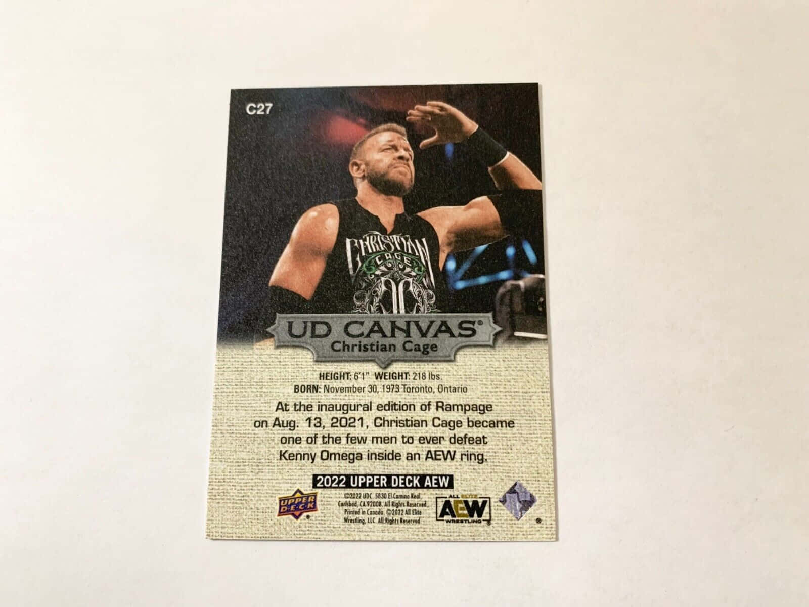 摔角手Christian Cage喺2022年Upper Deck AEW交易卡上，附有統計數據同傳記。