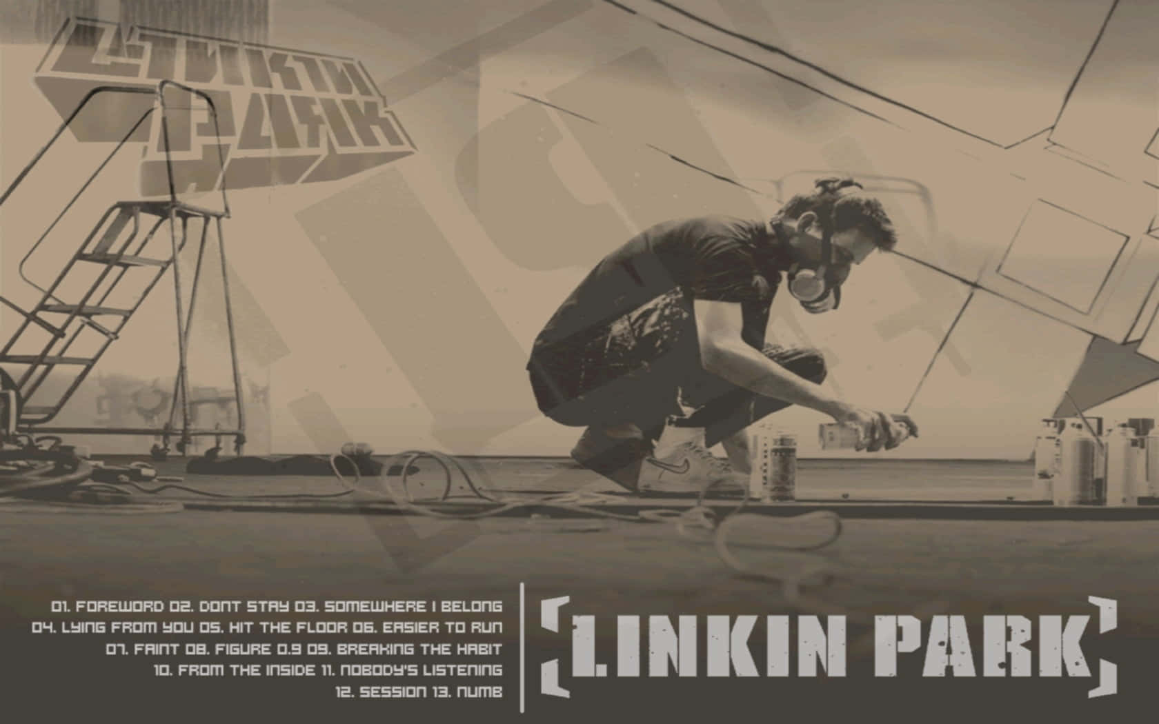 藝術家在 Linkin Park 標誌下於屋頂噴漆塗鴉。