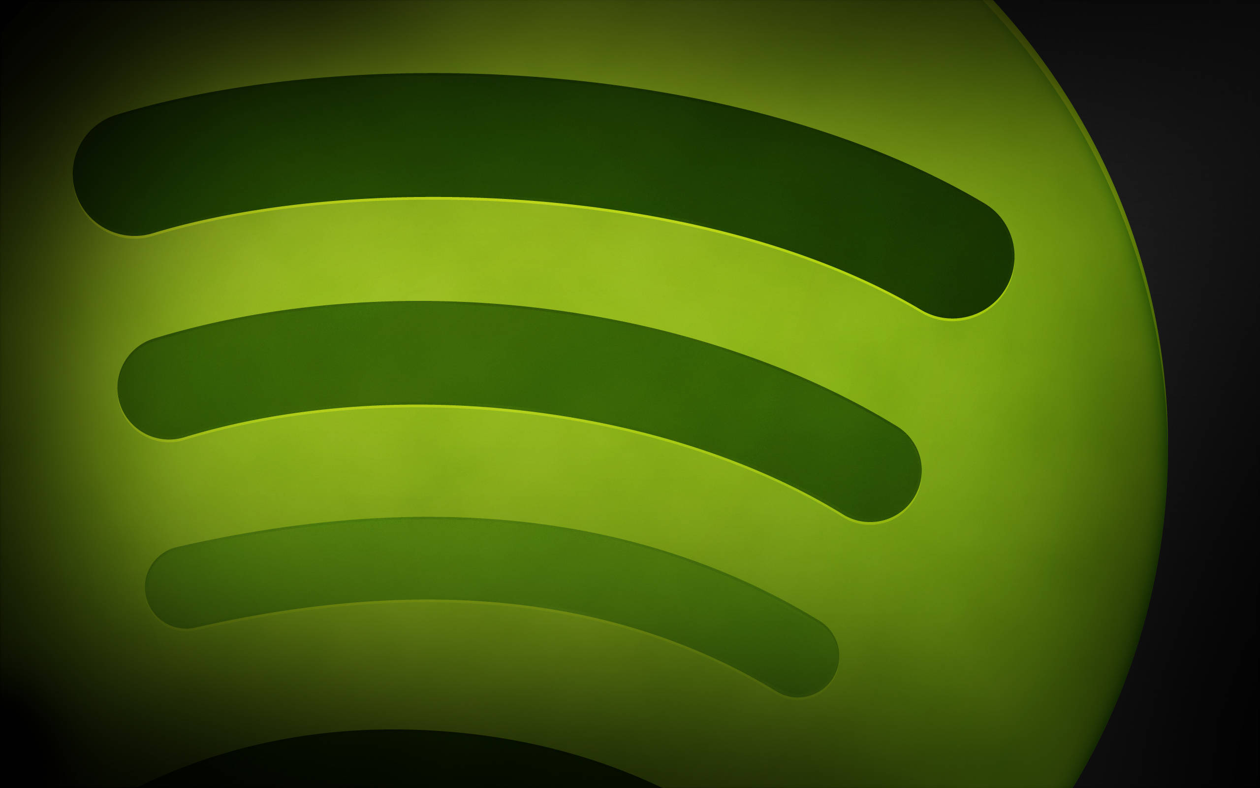 全螢幕 Spotify 標誌 壁紙 — 一個發光的綠色Spotify標誌，帶有漸變燈光，襯托在深色背景上。