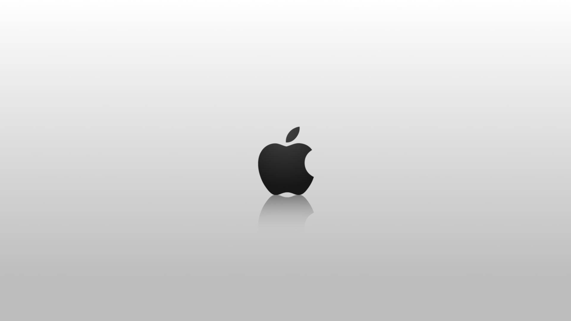 黑色Apple標誌帶倒影，灰色漸變背景