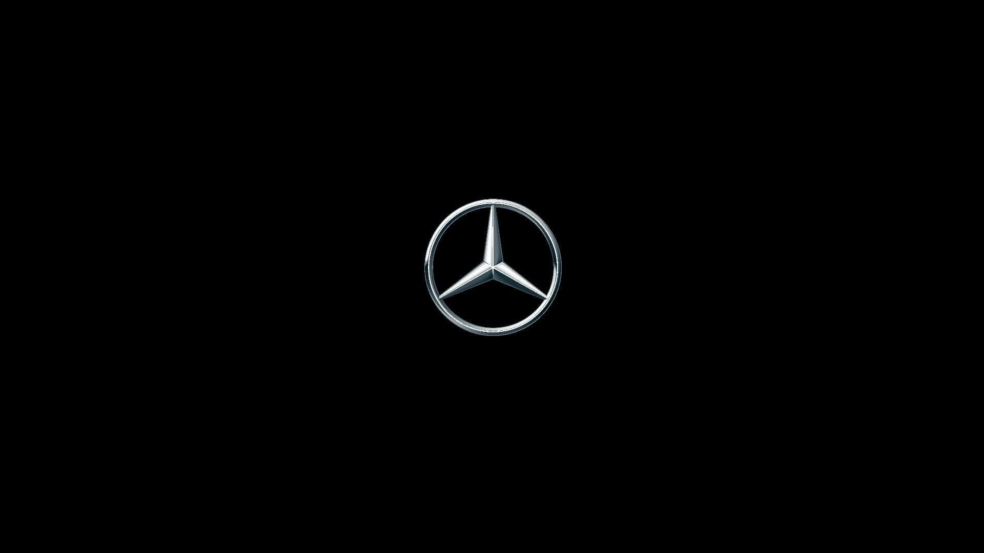 黑色背景上的銀色 Mercedes-Benz 標誌