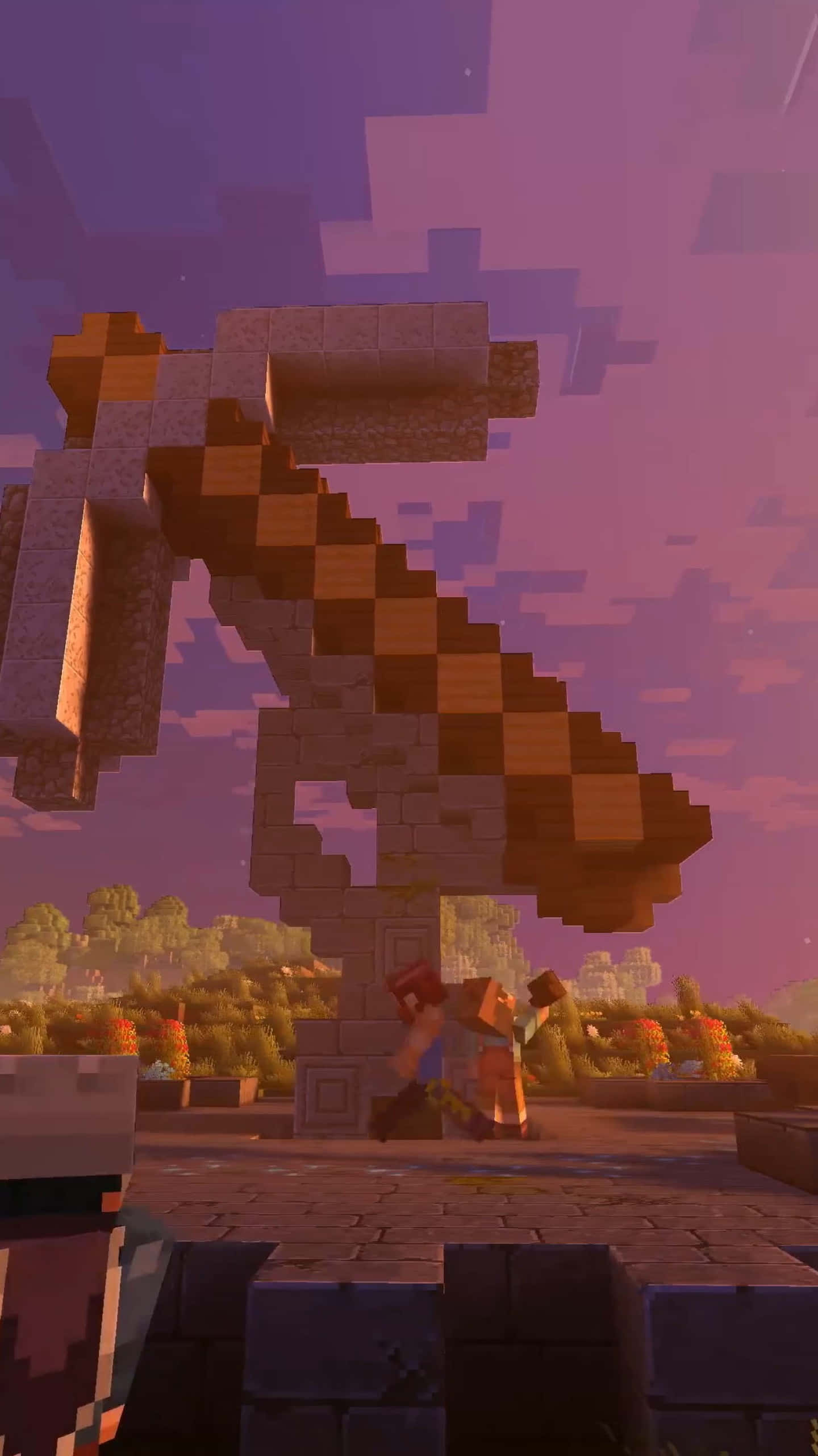 Minecraft Phone 桌布 壁紙 — 兩位Minecraft玩家站在紫色日落天空下的一座巨大像素龍雕像前。