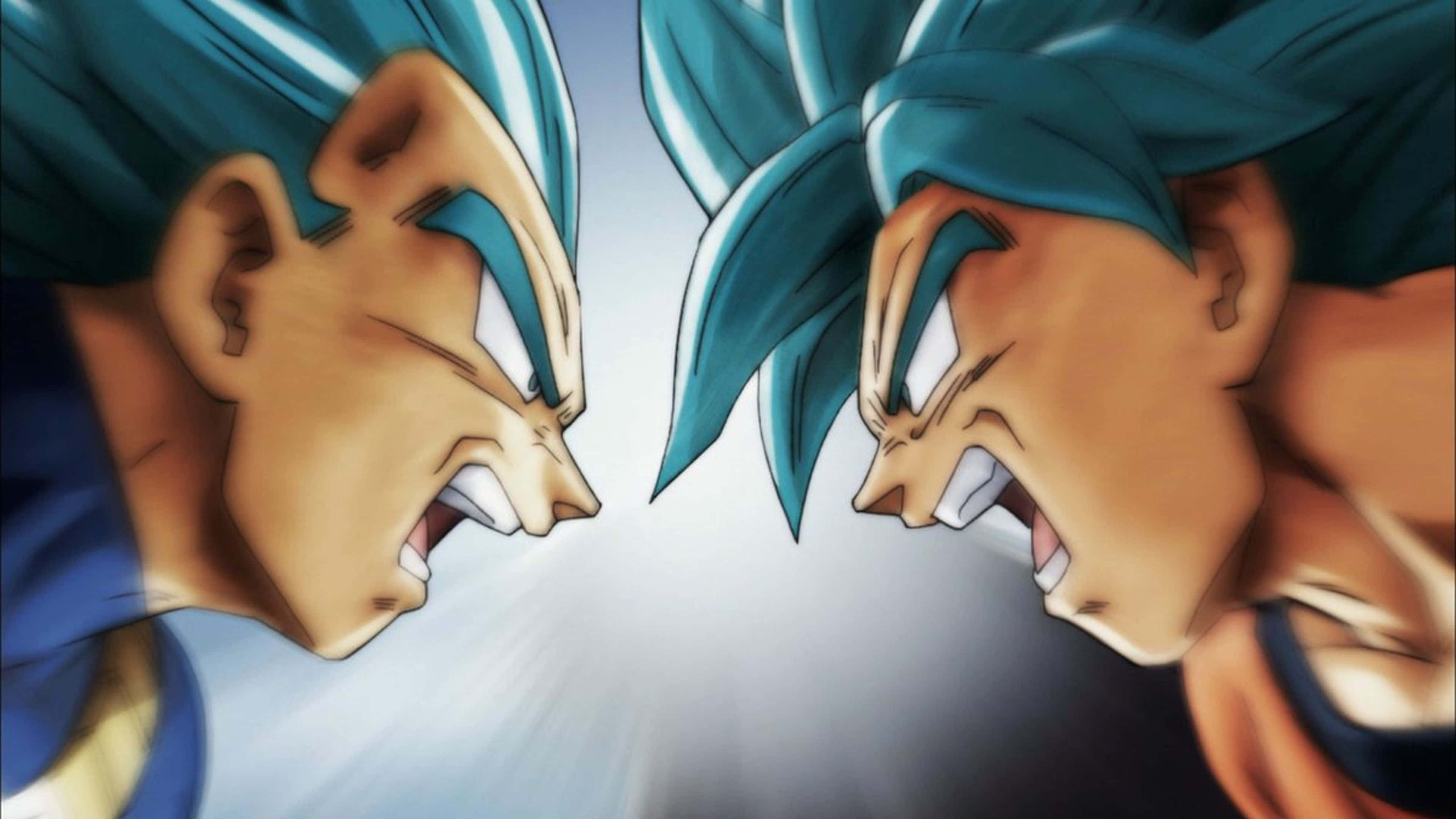 Vegeta And Goku 桌布 壁紙 — 兩位藍髮動漫戰士面對面激烈交戰，發出戰鬥吶喊，其間有發光的能量輻射。