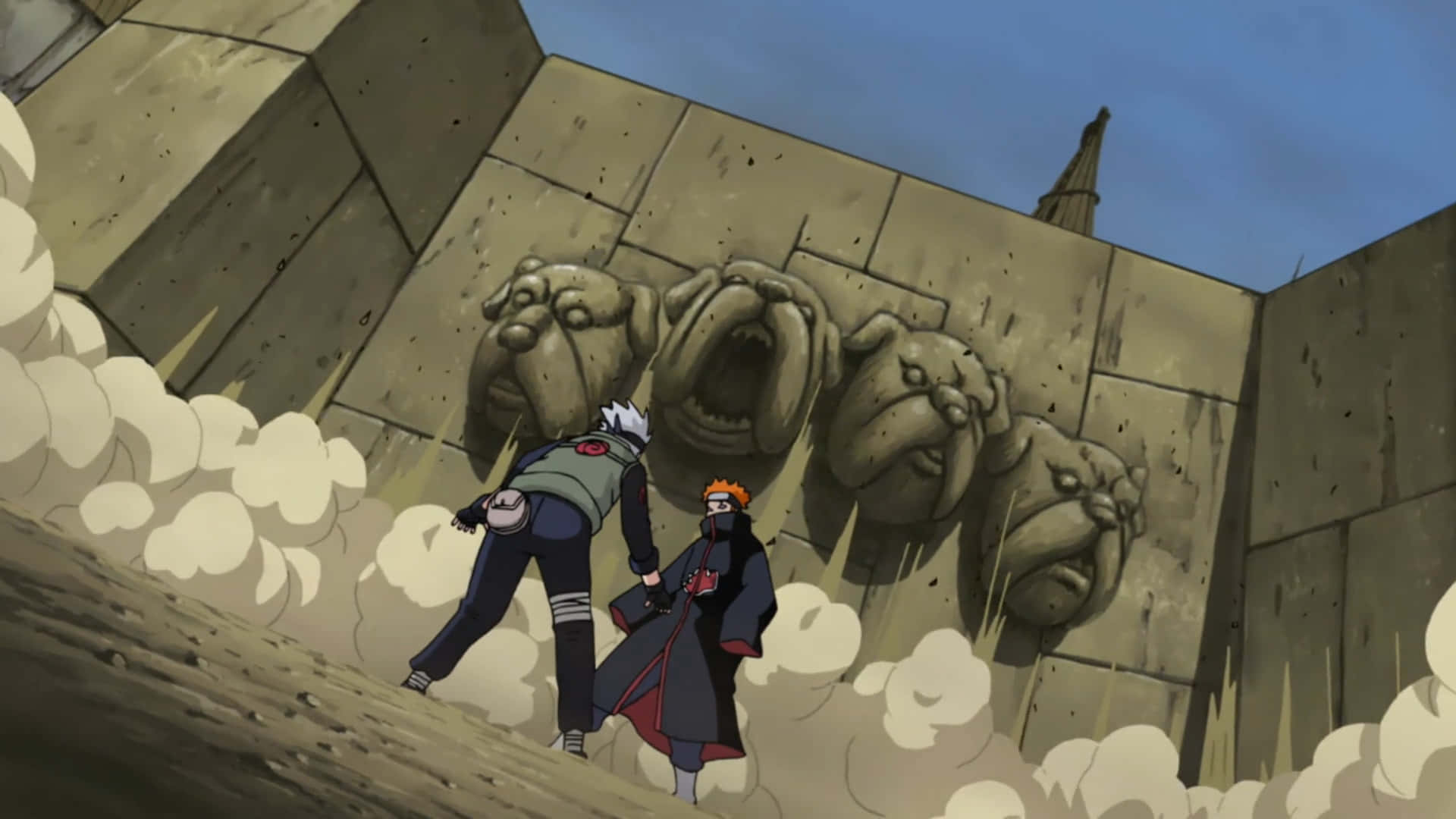 Kakashi And Pain 桌布 壁紙 — 兩個動漫忍者站在一面刻有咆哮獅頭的巨大石牆前，灰塵在他們腳邊旋轉。