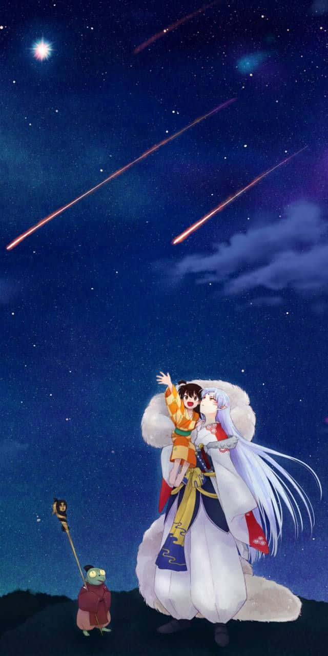 Inuyasha And Rin 桌布 壁紙 — 兩個動漫角色仰望佈滿流星和明亮星星的星空。