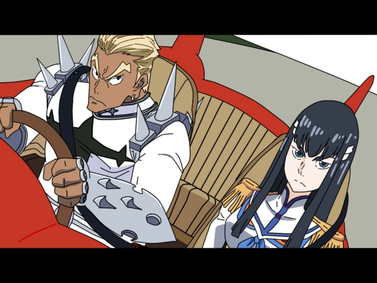 Ira Gamagoori 桌布 壁紙 — 兩個動漫角色喺一架有尖刺嘅裝甲車入面，表情堅定。