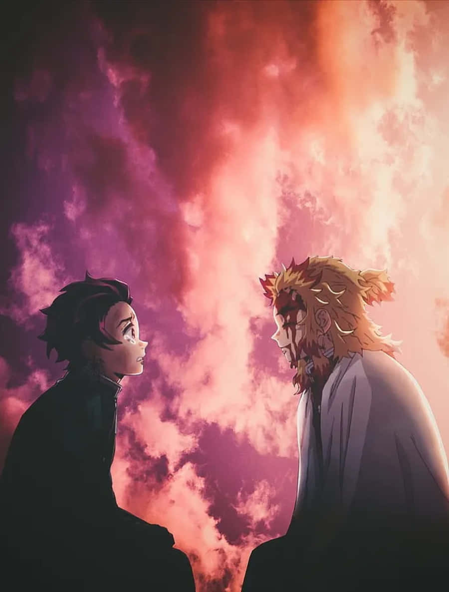 Rengoku And Tanjiro 桌布 壁紙 — 兩個動漫角色在火熱的粉紅色和橙色天空下，伴隨著戲劇性的雲層，面對面。