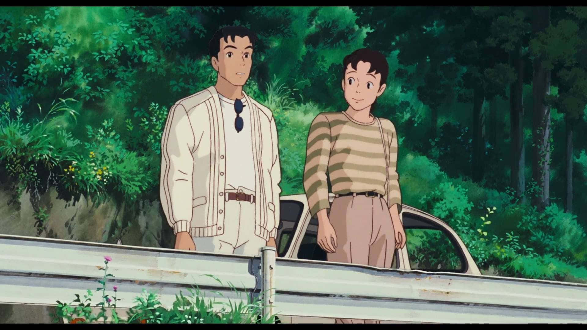 Only Yesterday 桌布 壁紙 — 兩個年輕男子站在一輛復古車旁，身處綠樹成蔭的森林道路。