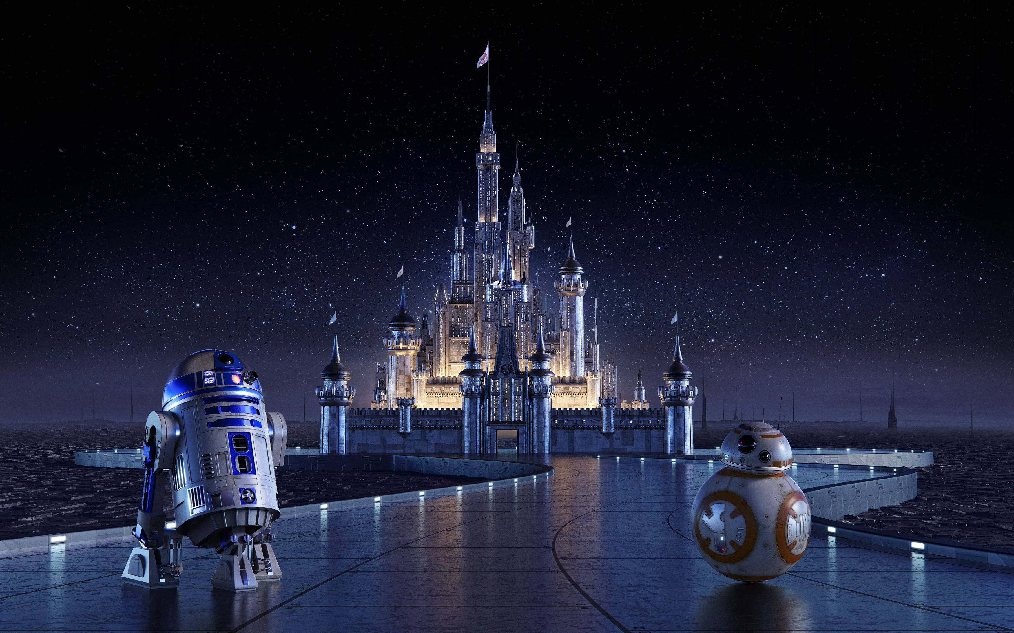 R2-D2 和 BB-8 機械人在夜晚星空下，位於燈光璀璨的迪士尼城堡前。 — 迪士尼桌面 壁紙
