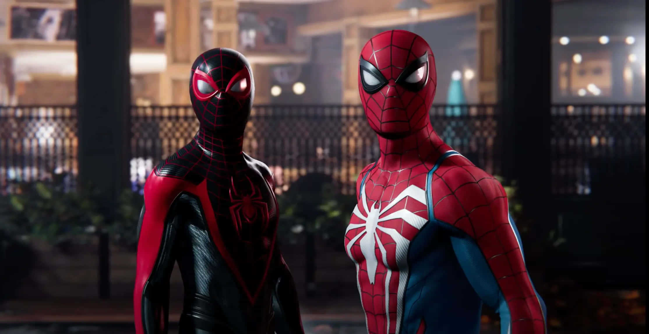 Superhero Video Games 桌布 壁紙 — 兩個蜘蛛俠角色在夜晚昏暗的城市小巷中並肩站立，眼睛發光，服裝細節豐富。