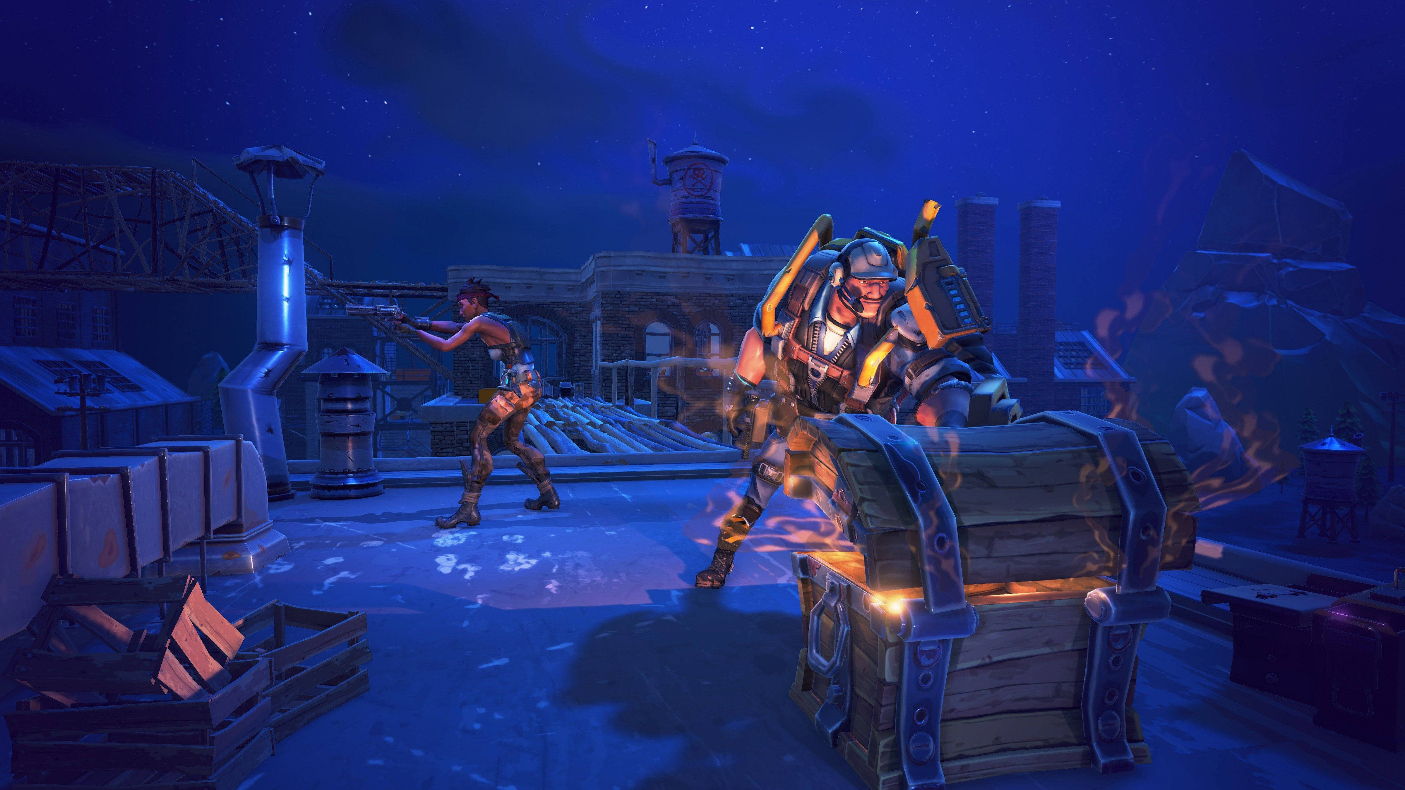 Fortnite 桌布 壁紙 — 兩個裝甲角色在星空下的屋頂上戰鬥，周圍有發光的板條箱和工業結構。